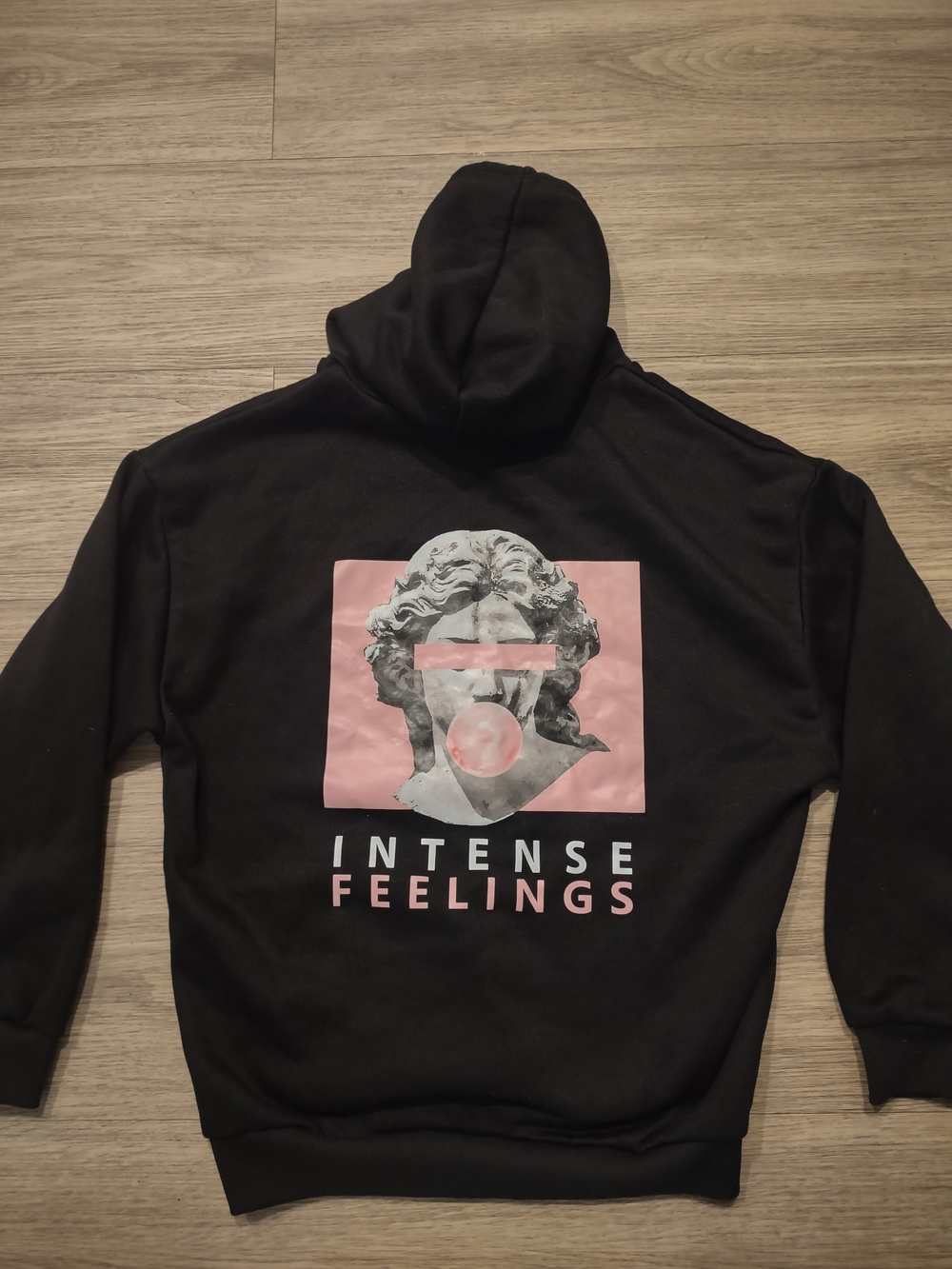 Women's Black Hooded Sweatshirt with Pink Graphic - Intense Feelings